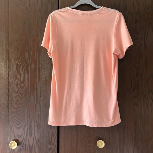 H&M peach colored top with design in front. Size 12 - Picture 4 of 4